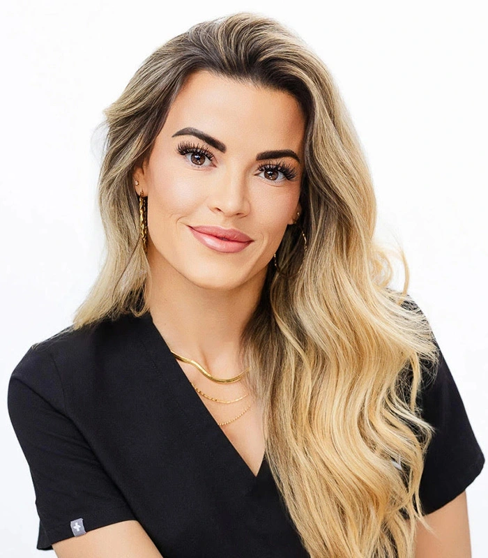 a woman smiling at camera