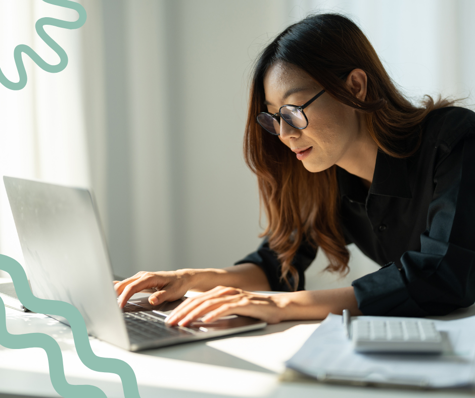female marketing employee working on med spa paid advertising campaign on laptop
