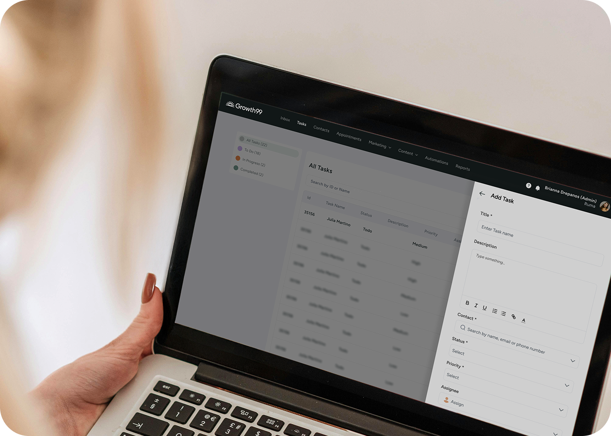woman looking at computer and growth99 product seeing how much growth their practice is experiencing